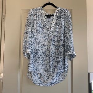 Moda International semi-sheer blue floral blouse